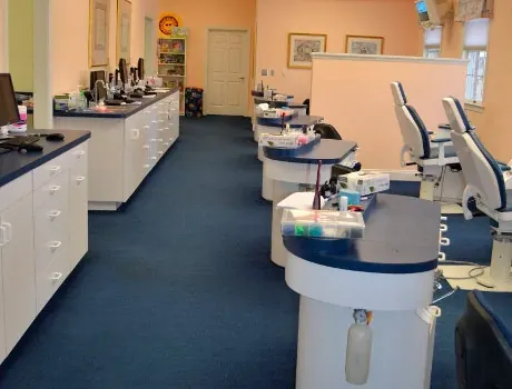 The treatment bay at the Hereford office, with orthodontic chairs and blue counters.